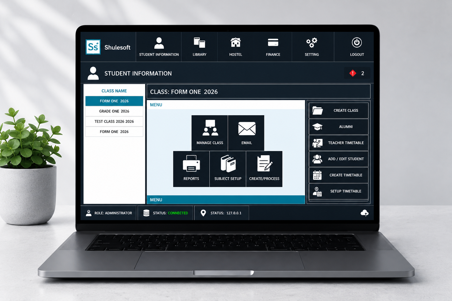 ShuleSoft student information dashboard on a laptop